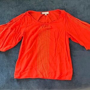 Jennifer Lopez Vibrant Red Blouse with Gold Accents